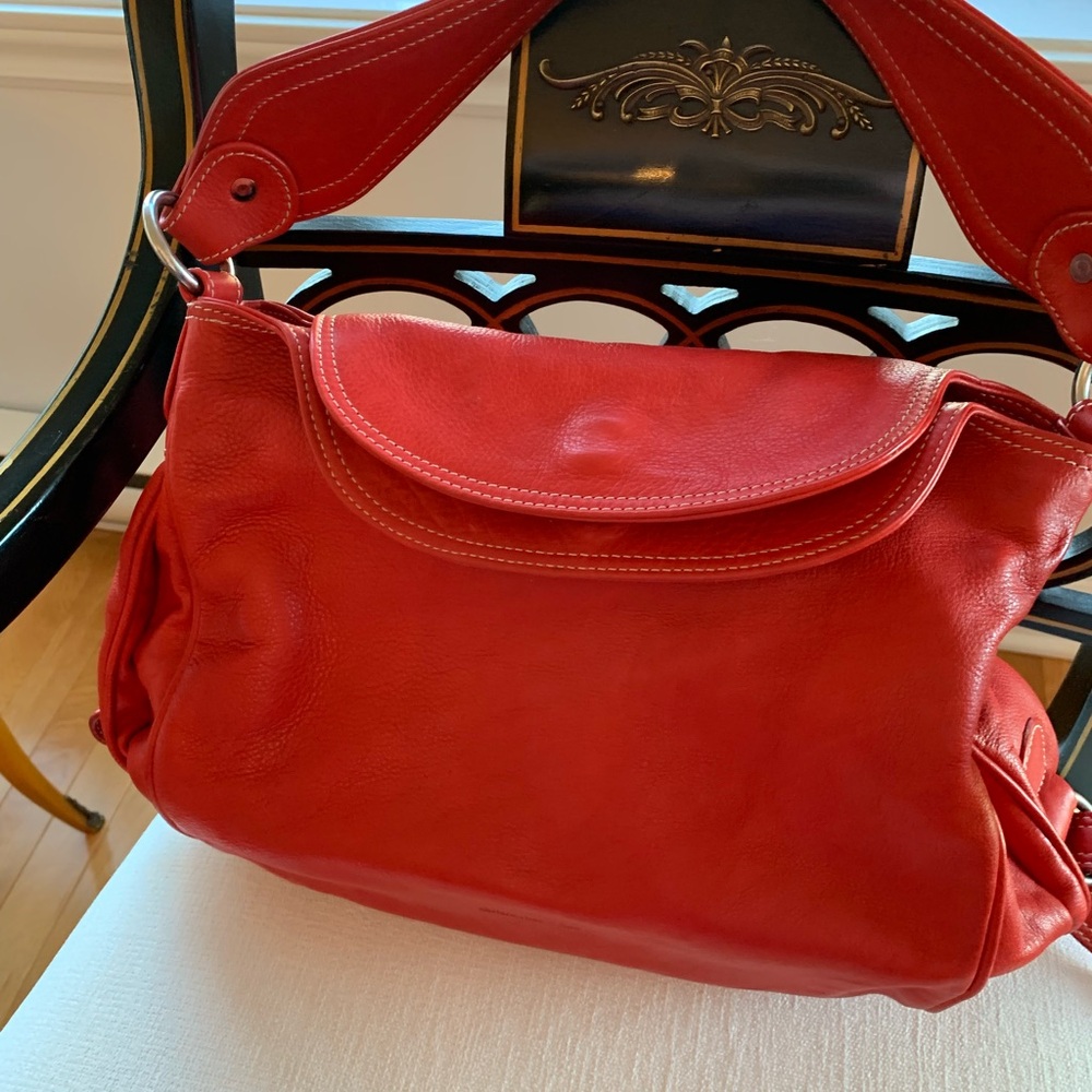 Striking Red Leather Shoulder Bag with Flap Closure